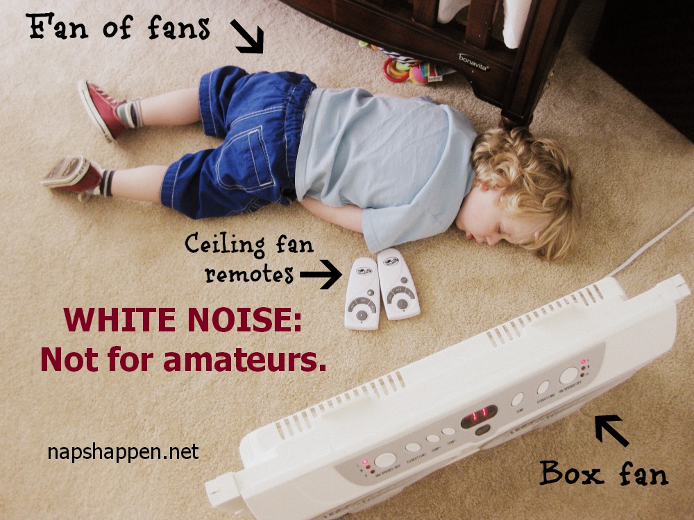 child asleep with fans