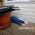 child asleep on deck planks