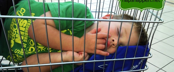 child asleep in cart