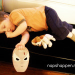 child asleep with mask